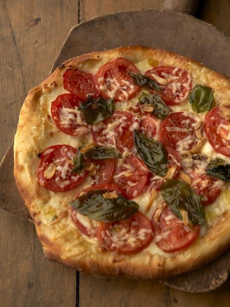 Get Pizza with Fresh Tomatoes and Basil Recipe from Food Network Pissaladiere Recipe, Basil Pizza, Pizza Rustica, Basil Recipes, Giada De Laurentiis, A Pizza, Fresh Tomatoes, Cooking Techniques, Homemade Pizza