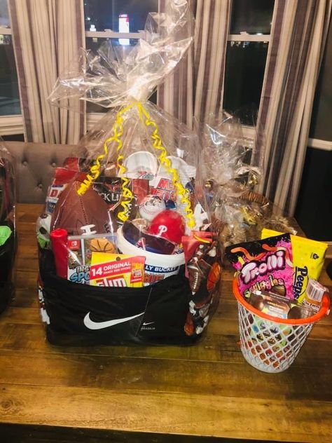 Basketball Easter Basket Ideas, Sports Themed Raffle Baskets, Sports Fan Gift Basket, Barbie Easter Basket, Gamer Easter Basket, Sports Easter Basket, Basketball Theme Easter Basket, Easter Basket Themes, Candy Gift Baskets