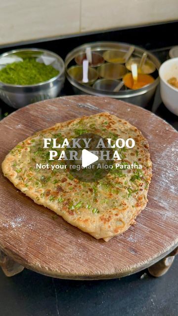 253K views · 9.2K likes | NIKITA SHAH | FOOD & TRAVEL on Instagram: "Flaky Aloo Paratha  Aloo Paratha is an emotion! And this flaky, layered version takes it up several notches. So flavourful, wholesome & comforting ❤️  You have to give it a try & let me know what you think of this version💫  🥔Combine boiled mashed potatoes with coriander powder, red chilli powder, garam masala powder, amchur powder, coriander seeds, ajwain, green chili paste and ginger paste alongwith fresh coriander & salt  🥔Mix it and your filling is ready 🥔Flatten out your paratha dough (Made using wheat flour, salt, water & some oil), drizzle little oil on top & spread it evenly. 🥔Make a slit in the paratha, place the aloo filling on one side & and cheese on the other. Fold it as shown in the video 🥔Top it up wit Allo Paratha Recipe, Allu Paratha Recipe, Aalo Paratha Recipes, Aloo Paratha Recipe Video, Gobi Paratha Recipes, Alu Paratha, Amchur Powder, Aloo Paratha Recipe, Garam Masala Powder