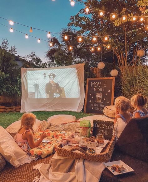 Outdoor Projector Movie Night, Summerween Sleepover, Outdoor Movie Night Ideas Backyards, Fall Outdoor Movie Night, Outside Movie Night Party, Movie Night Outside, Movie Night Under The Stars, Outdoor Movie Night Ideas, Backyard Movie Night Party