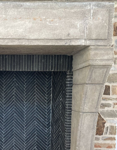 FireRock fireplace with black firebrick in a split herringbone pattern Herringbone Fireplace Surround, Herringbone Fireplace Tile, Herringbone Fireplace, Fireplace Lounge, Modern Farmhouse Fireplace, Farmhouse Fireplace, Black Fire, Fireplace Tile, Decor Details