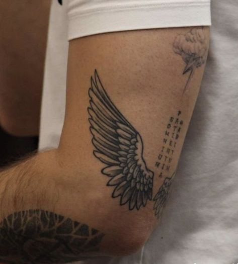 Angle Wings Tattoo Men, Wing Elbow Tattoo, Wings Tricep Tattoo, Small Elbow Tattoo Men, Mens Angel Wing Tattoo, Wings Tattoo On Forearm, Angel Wings Tattoo Men, Tricep Tattoo Men Simple, Angel Wings Tattoo For Men