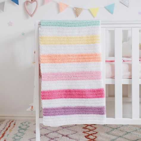 I searched high and low for the perfect blanket for our pastel rainbow nursery theme. Whilst there are lots of baby blankets out there to choose from, so many of them are not bright and fun. They are pale and uninspiring. So I decided to create my own..... I carefully matched each and every yarn colour to the colours of our bestselling pastel rainbow bunting. Hours of crocheting later... and this is the outcome ❤️ I couldn’t be more pleased with how it’s turned out. In fact I’m quite attache... Rainbow Nursery Theme, Pastel Rainbow Nursery, Rainbow Bunting, Rainbow Blanket, Nursery Theme, Rainbow Nursery, Nursery Themes, Pastel Rainbow, Baby Blankets