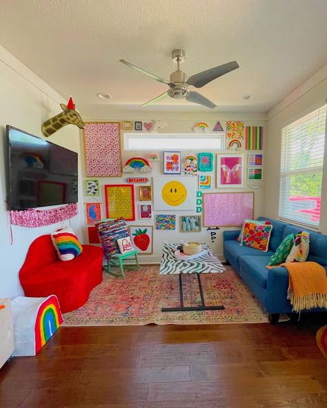 lots of colorful prints and canvas. Zebra Table. Lips couch. Lots of rainbows and smiley faces. Lisa Frank Home Decor, Rainbow Maximalist Decor, Smiley Face Room, Smiley Decor, Rainbow Living Room, Rainbow Office, Rainbow Furniture, Colorful Maximalist, Rainbow Home Decor