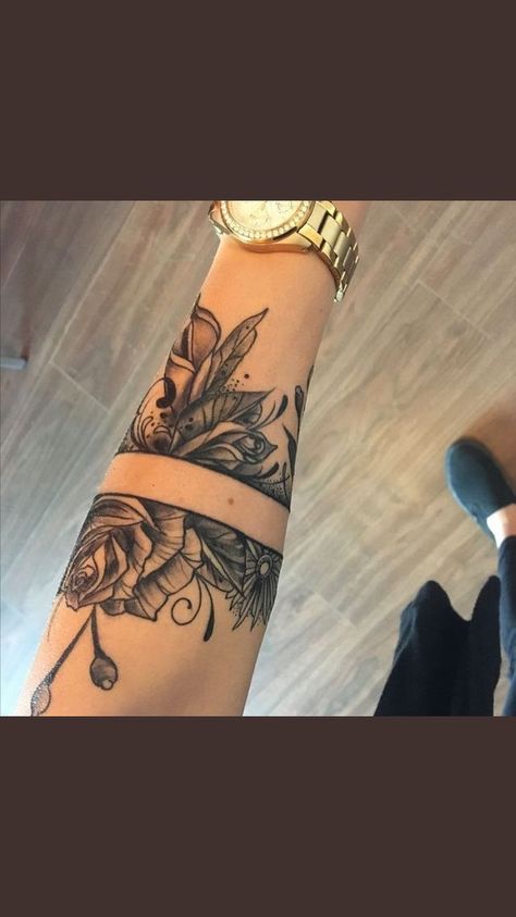 split floral tattoo Floral Arm Tattoo, Armband Tattoos For Men, Tato Henna, Forearm Band Tattoos, Flower Wrist Tattoos, Armband Tattoo Design, Anklet Tattoos, Flower Tattoo Arm, Geniale Tattoos