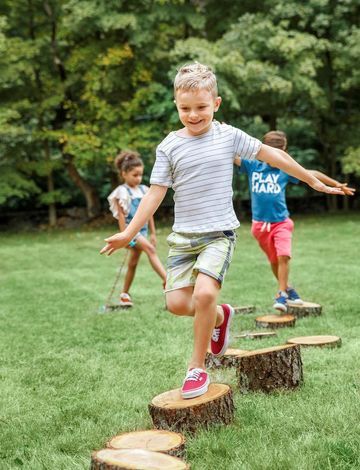 Create this balance challenge with a path of cut logs in varying heights. Contact your local tree trimmer to see if he can donate scraps, or cut them yourself in heights ranging from 2” to 10”. Space the stumps far enough apart so kids have to carefully plot each step as they walk the path. Fun Backyard, Outdoor Play Areas, Kids Outdoor Play, Natural Playground, Backyard Playground, Backyard Play, Backyard Living, Fun Family Activities, Backyard Fences