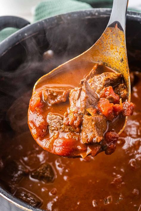 This texas chili recipe will be a crowd pleasing favorite! Tender stew meat cooked with smoky, savory spices, without beans is delicious and easy to make. Chili Recipe Meaty, Beef Cube Chili Recipe, Chili Recipe Using Stew Meat, Chili Recipe Texas Style, Beef Stew Chili Recipe Crockpot, Beef Tips Chili Recipe, Cubed Beef Chili, Beef Chili Recipe No Beans, Texas Chili With Stew Meat