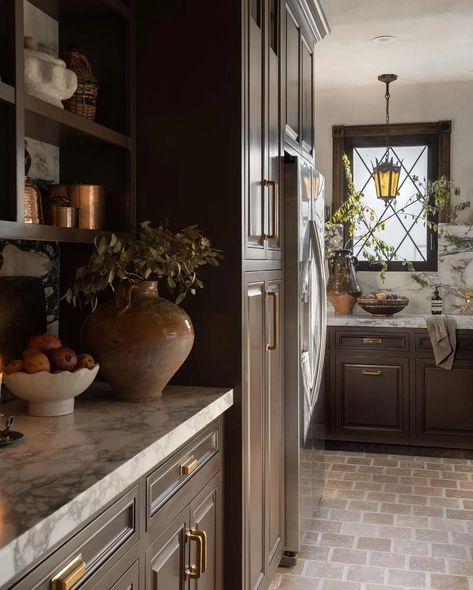 Kitchen Remodel Western, Moody Mid Century Kitchen, Colonial Style Kitchen Ideas, The Roaring Creek Home, Dark Brown Home Interior, Italian Countryside Interior Design, Brown Painted Cabinets Kitchen, Colorful Eclectic Home Living Room, Moody Parisian Interior