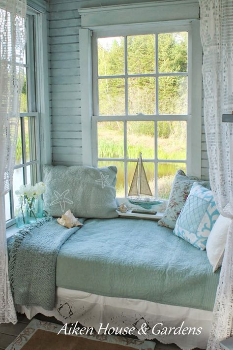 25 ways to go coastal with a waterfront view. Decorating with coastal pillows, art work, lanterns, flowers and coral. Create a coastal theme room. Sleeping Porch, House Of Turquoise, Dream Beach Houses, Style Cottage, Beach Cottage Decor, Beach House Interior, Beach Cottage Style, Cozy Nook, Coastal Cottage