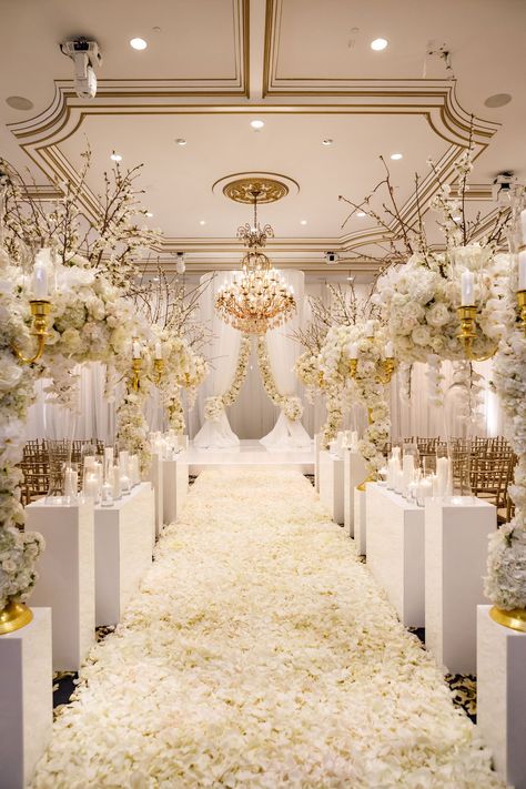 white-and-gold-ballroom-wedding-ceremony-white-flower-petals-arrangements-gold-molding-chandelier White And Gold Wedding Themes, Elegant Wedding Ceremony, White Wedding Decorations, White Wedding Theme, Luxury Wedding Decor, Gold Wedding Theme, Gold Wedding Decorations, Party Deco, Wedding Entrance