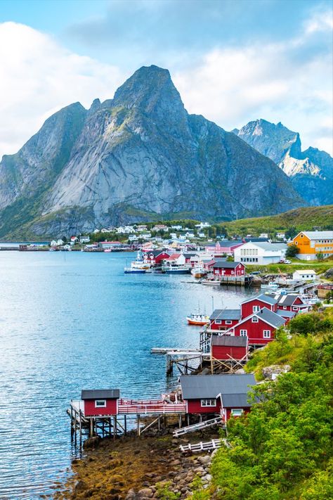 Reine fishing village in Lofoten with Reinebringen mountain top in the background Norway Landscape, Northern Norway, Visit Norway, Nordic Countries, Fishing Villages, Life Is An Adventure, At A Glance, Magical Places, Archipelago