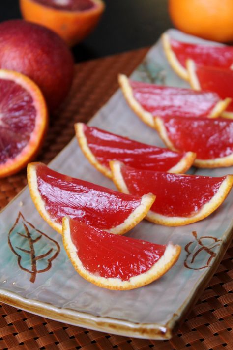 You don't have to be in college to enjoy these jello shots. Prepare them inside of the rinds of blood oranges to impress guests at your next party. Orange Jello Shots, College Party Games, Margarita Jello Shots, Margarita Jello, Best Jello Shots, Orange Margarita, Alcoholic Treats, Margarita Cupcakes, Jelly Shots