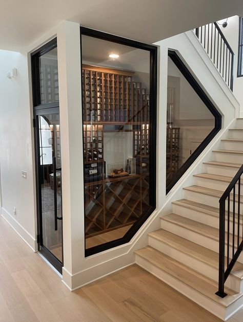 Staircase With Wine Cellar, Modern Wine Room Ideas In House, Wine Cellar Below Stairs, Glass Wine Room Under Stairs, Under The Stair Wine Storage, Kitchen Wine Cellar Ideas, Wine Bar Room In House, Wine Cellar In House, Wine Cellar In Garage