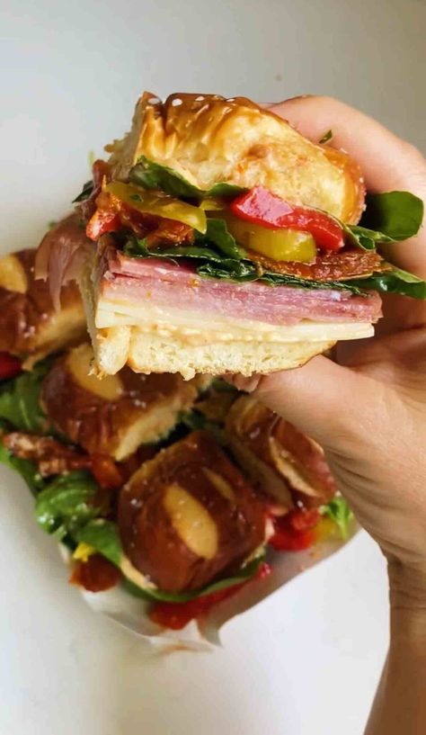 Italian Sliders on Hawaiian Pretzel Rolls - Grilled Cheese Social Kings Hawaiian Pretzel Bun Sliders, Hot Sandwiches For A Crowd, Pretzel Roll Sandwich, Pretzel Buns Sandwich, Pretzel Bun Sliders, Pretzel Roll Recipe, Italian Sliders, Pretzel Sandwich, Cold Sandwich Recipes