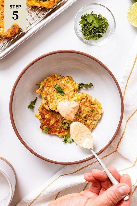 A quick and simple zucchini and corn fritter is the perfect way to use up the best of the late summer season. An easy-to-make batter is mixed together, and small pancake-shaped fritters are fried on the stovetop. When paired with a chipotle sauce, these are a scrumptious side dish! | wyseguide.com #recipe #corn #sweetcorn #zucchini #fritter Zucchini And Corn Fritters, Zucchini Corn Fritters, Corn Fritter, Zucchini Corn, Sweet Potato Casserole Easy, Corn Fritters, Side Dish Recipes Easy, Shredded Zucchini, Chipotle Sauce