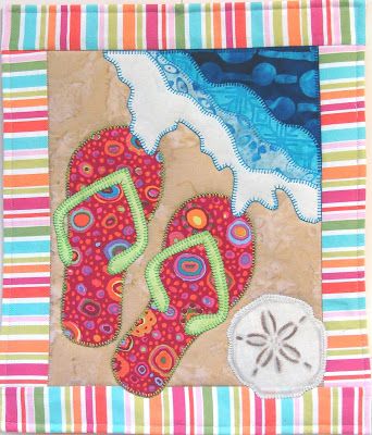 As many of you know we have been featuring a mini quit for each month. We started out in January with a purchased pattern. Bu... Flip Flop Quilt, Beachy Quilts, Hawaiian Fabric Quilt, Beach Themed Quilts, Beach Quilts, Tropical Quilts, Beach Quilt, Sewing Quilts, Seaside Theme