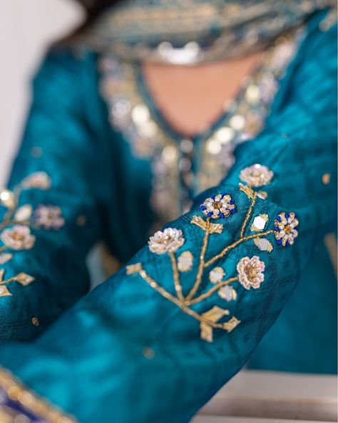 Amel - A majestic fusion of firozi and dark blue hues, adorned with intricate cutdana sequins and resham embroidery. With its heavily embellished borders and classic silk dupatta, it epitomizes traditional charm with a modern twist. #ZivaEidLuxe #reneebyzunairateli #pakistanifashion #luxurypret #pretwear #Eid #Amel Resham Embroidery, Silk Dupatta, Pakistani Fashion, Blue Hues, Borders, Dark Blue, Twist, Embroidery, Silk