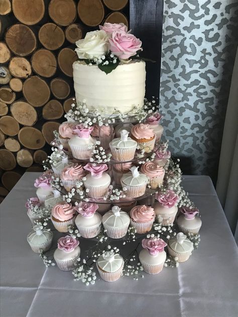 Wedding Cake Tower With Cupcakes, Wedding Cake Cupcake Tower, Wedding Cake And Cupcake Ideas, Cake With Cupcakes Display, Engagement Cupcake Ideas, Wedding Cupcakes Ideas Simple, Cupcake Wedding Cake Ideas, Wedding Cupcake Designs, Wedding Cake And Cupcake Display