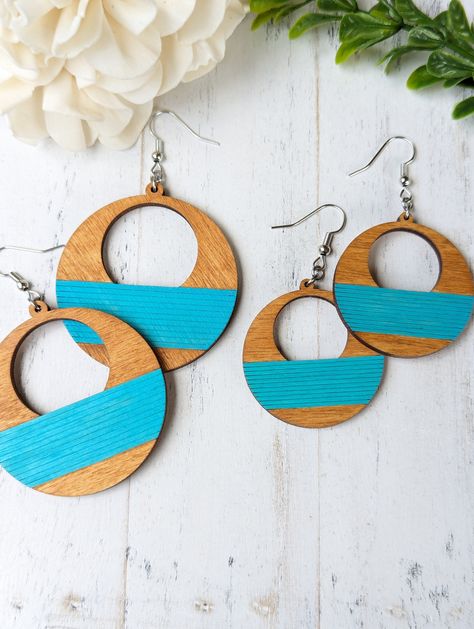 These beautiful Wooden Earrings are the perfect addition to any outfit. The high-quality wood adds a natural touch while the dangle design gives you a stylish and trendy look. Wear them to dress up any casual outfit or pair them with your favorite dress for an elegant night out. You'll love how versatile and lightweight these earrings are! Made in three different sizes: Small Size Length: 1.5" Drop length with ear wire hook 2.5"  Medium Length size 2" Drop length with ear wire hook 3"  Big size Hand Painted Earrings Wood, Wood Dangle Earrings, Earrings Wood, Hand Painted Earrings, Abstract Earrings, Painted Earrings, Earrings Flower, Wooden Earrings, Wood Earrings