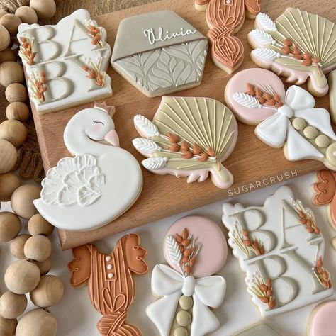 Sugar Crush on Instagram: "Boho Swan Baby Shower. . . . . . . . . #swancookies #bohocookies #bohobabycookies #babyshowercookies #alittlecutieisonthewaycookies #customcookies #instacookies #partycookies #eventcookies #decoratedcookies #sugarcookies #sugarcookiesofinstagram #royalicingcookies #royalicing #shoplocal #shopsmall #sangabrielvalley #templecitycookies" Boho Gender Reveal Cookies, Swan Baby Shower Ideas, Boho Sugar Cookies, Boho Baby Shower Cookies, Shower Minimalist, Swan Baby Shower, Grandma Cookies, Beach Cookies, Crazy Cookies