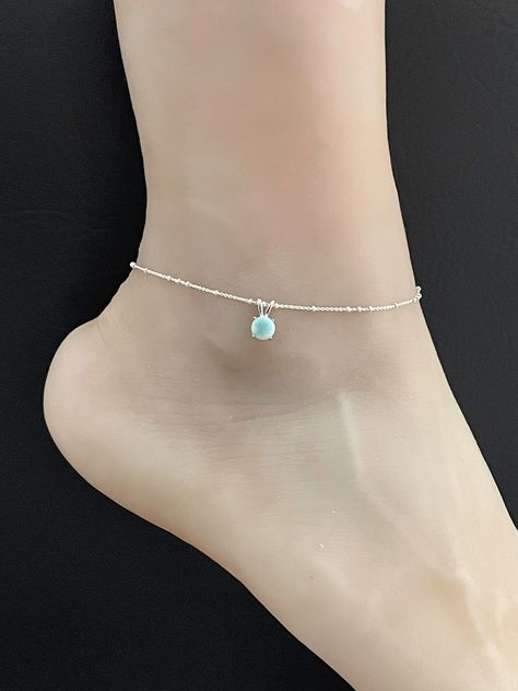 "Genuine Larimar Anklet Minimalist and Dainty Beaded Bridal Wedding Charm Anklet ANKLET FEATURES: Metal:  All components are made from solid .925 Sterling Silver  Model is wearing 10\" in length  solid .925 Sterling Silver Bead Chain Chain Length:  9 inch + 1 inch extension  Please send me a message if you have any questions before or after placing your order.  Please visit my storefront to view more of my creations: vonzjewel.etsy.com Thanks a lot for stopping by and supporting my boutique Vonz Anklet With Beads, Ankle Chain Silver, Black Anklet, Elegant Anklet, Silver Chain Anklet, Silver Anklets Designs, Cute Anklets, Star Anklet, Wedding Anklets