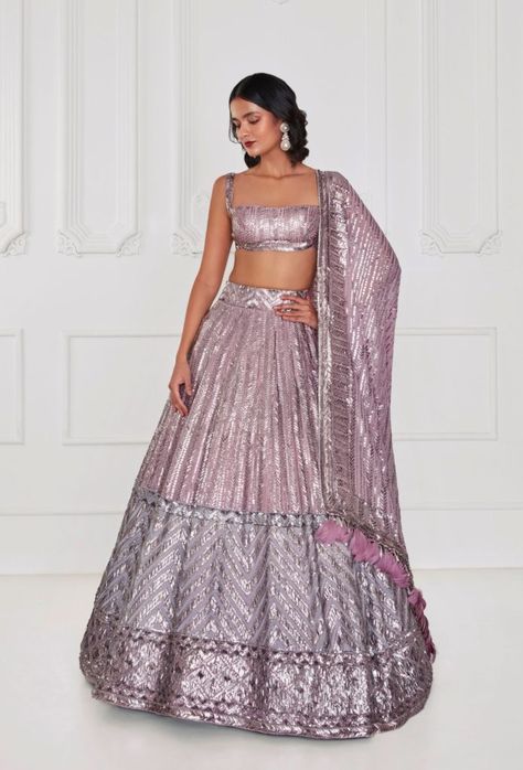 Glow in the lustre of lilac chiffon silver embroidered lehenga paired with tonal blouse and drape This is a Three piece look. Jewellery: Manish Malhotra Jewellery by Raniwala 1881. Please note: Produc Lehenga Aesthetic, Lilac Lehenga, Sequins Lehenga, Embroidered Lehenga, Manish Malhotra, Silk Tulle, Contemporary Chic, Manish, Yellow Fabric