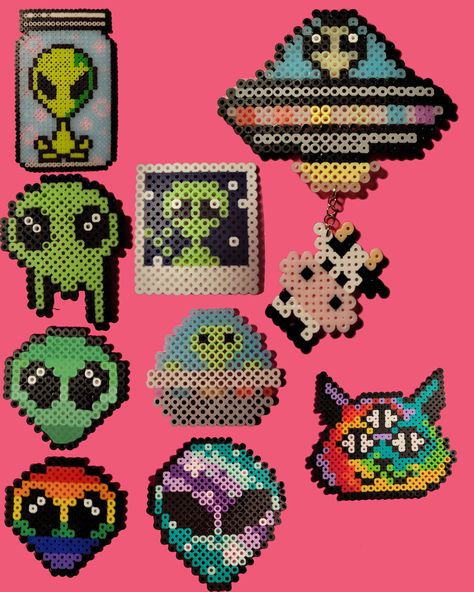 perler bead art of an aliens variety. You get one. Can be customized, color or type and size. Mini space craft: 3x3 in (glow in the dark) Small alien (green/gray/queer flag): 3x2in Polaroid: 3x3 in Drip alien: 4x3 in Alien face: 5x4in Alien cat: 5x4 in Space craft with cow: 7x5 in (glow in the dark) Alien in jar: 6x4 in (glow in the dark, mini beads) Made to order. Alien Arts And Crafts, Horror Perler Beads Small, Bigfoot Perler Beads, Perler Bead Lava Lamp, Perler Bead Inspiration, Perler Beads Glow In The Dark, Perler Bead Asthetic Ideas, Alien Perler Bead Patterns, 90s Perler Bead Pattern