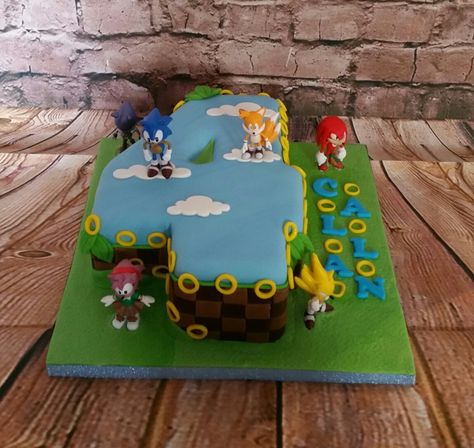 Sonic the hedgehog themed number 4 cake Number 4 Sonic Cake, Number 5 Sonic Cake, Sonic Number Cake, Super Sonic Cake, Sonic Cakes, Super Sonic The Hedgehog, Number 4 Cake, Baby Birthday Party Invitations, Lego Sonic