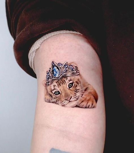 Impressive Tiger Tattoo Ideas For The Lower Arm #tattooideas #tattooideasforgirls #tattooideasforguys #womenstattoo #tattoodesign #tattoostyle Lower Stomach Tattoos For Women, Tiger Tattoo Small, Tiger Tattoo Ideas, Cub Tattoo, Rosen Tattoo Frau, Unique Half Sleeve Tattoos, Tiger Tattoos, Cubs Tattoo, Wrist Tattoo Cover Up