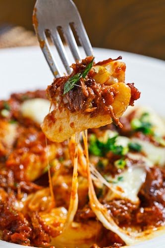 Gnocchi Poutine with Short Rib Ragu and Gremolatta with Stringy Melted Cheese Short Rib Ragu, Poutine Recipe, Ragu Recipe, Pasta Fatta In Casa, Short Rib, Think Food, Poutine, Short Ribs, Italian Dishes