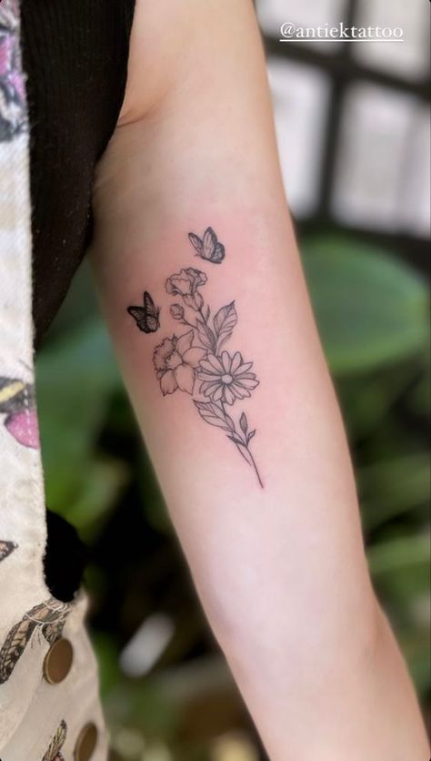 Floral Butterfly Arm Tattoo, Bouquet Of Flowers Tattoo With Butterfly, Two Butterflies With Flowers Tattoo, Flowers And Butterflies Tattoos Small, Dainty Feminine Tattoos Arm, April Birth Flower Tattoo With Butterfly, Fine Line Floral Butterfly Tattoo, Butterflies On Flowers Tattoo, Carnation Tattoo With Butterfly