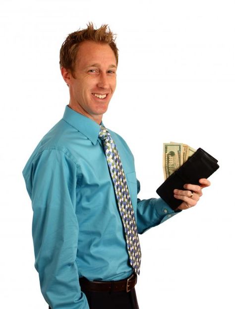 A young businessman holding a wallet with money. Wallet With Money, Business Man, Hold On, Wallet, Money, Quick Saves