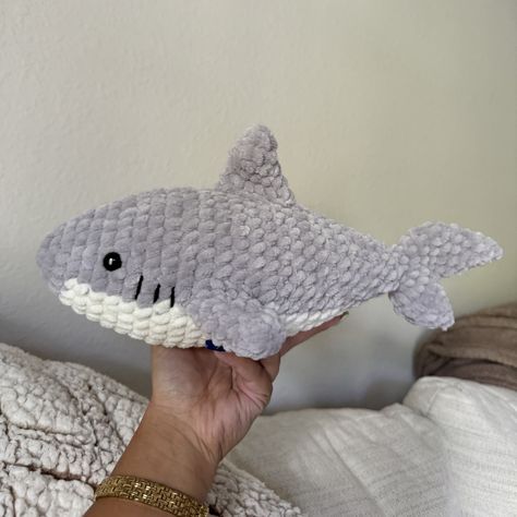 this cute shark plush is the perfect accessory for your desk, bed, car, or gift for someone special!  available in the colors shown (grey, ivory) (indigo, ivory) / or let me know if you want a different color! (main color and accent color) made with chenille yarn and safety eyes about 12" long Crochet Shark Amigurumi, Shark Crochet Plushie, Grey Crochet Animals, Cute Shark Stuff, Big Crochet Plushies, Crochet Chenille Yarn, Plushy Amigurumi, Crochet Shark Pattern, Sock Plushies