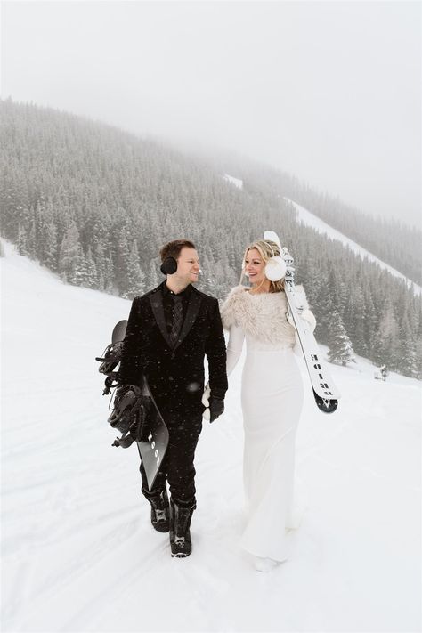 Skiing Bride and Groom | Winter Elopement Ideas | Winter elopement bride and groom carry snowboards and are smiling at each other, with snow-covered trees in the background during their snowy Colorado elopement. Discover colorado elopement venues, colorado mountain wedding winter, skiing elopement and skiing wedding photos. Book me as your Colorado elopement or wedding photographer at larsenphoto.co! Ski Resort Engagement Photos, Skiing Wedding Photos, Snowboard Engagement Photos, Ski Engagement Photos, Snow Wedding Photos, Ski Engagement, Skiing Wedding, Winter Elopement Ideas, Snowboard Wedding