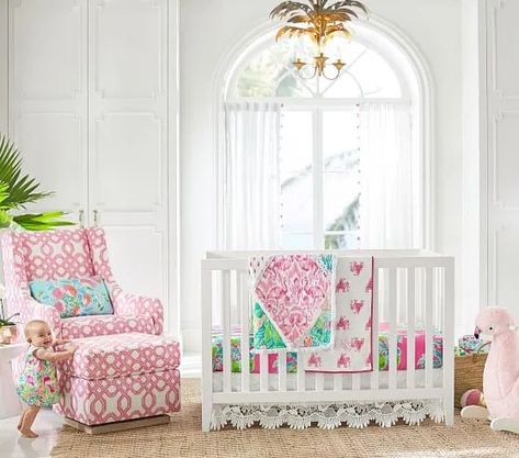 Lilly-Pulitzer-Nursery-Palm-Tree-Chandelier-Glider-Crib-Flamingo-Pottery-Barn-Kids - The Glam Pad Lilly Pulitzer Nursery, Colourful Bedrooms, Ocean Pottery, Pottery Barn Nursery, Girl Nursery Themes, Modern Crib, Anna Grace, Girl Nursery Room