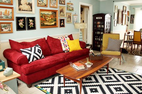 Love this home tour! Filled with fun collections, like cuckoo clocks, paint by number pictures, and matryoshka dolls. I think the neutral walls help it to feel comfortable - not too cluttered. Red Couches, Red Sofa Living, Red Sofa Living Room, Red Couch Living Room, White Rugs, Painting Room, Red Couch, Yellow Living Room, Living Room Red