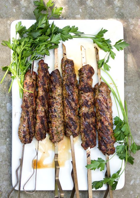 Every Middle Eastern country has a version of grilled Kofta Kebabs. It's hard to imagine anything more delicious! Especially with garlicky yogurt sauce! This recipe shows you how to make authentic Grilled Turkish Kofta Kebabs at home. #Kofta #Kebabs #TurkishBBQ Turkish Kofta, Kofta Kebab, Turkish Spices, Fruit Kebabs, Doner Kebab, Kebab Recipes, Eastern Cuisine, Yogurt Sauce, Lamb Recipes