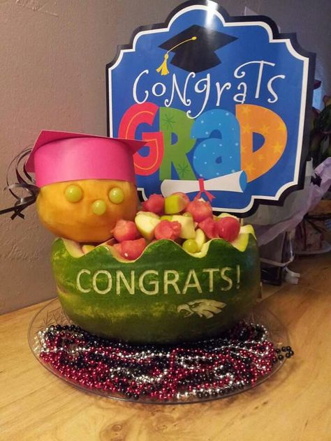 Graduation watermelon Graduation Watermelon Carving Ideas, Graduation Fruit Tray Ideas, Graduation Watermelon, Watermelon Carving Graduation, Watermelon Boat, Watermelon Ideas, Graduation Candy Buffet, Watermelon Bowl, Graduation Food