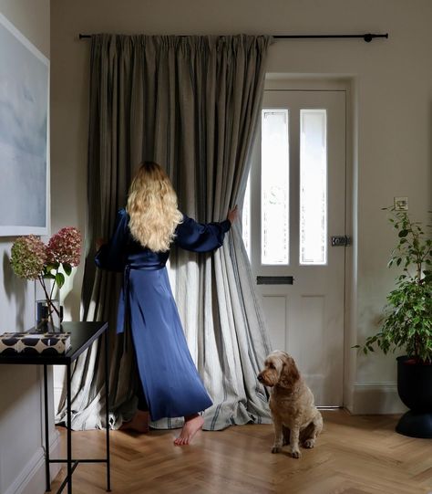 Making an entrance inviting with our beautiful linen curtains, this time in the home of artist and friend @megfarrellpaints. This Slade Stripe Inky Sky printed linen curtain effortlessly dresses Meg’s front door, keeping out the drafts and creating a relaxed, warm welcome. Curtain pictured here with a cottage header and oversized puddle drape for an informal scheme to suit any occasion. Curtain made to order by our expert makers. 🪡🧵 Get a quote for your own front door curtain through ou... Curtain Over Back Door, Front Door Window Curtains, Curtains Doorway, Front Door Curtain, Front Door Curtains, Curtains Pictures, Linen Curtain, Front Doors With Windows, Door Curtain