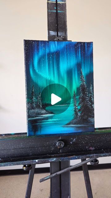 Kat Mugg on Instagram: "Aurora Reflections ✨️ I didn't have a lot of energy to paint today. I was traveling and fall cleaning my house this weekend and was feeling like just cuddling up on my couch with my dogs but I pushed through and painted this little piece. I feel accomplished and now it's cuddle time 🐶 . This video is being represented by LADbible Group. For any usage/licensing requests, please email licensing@ladbiblegroup.com #bobross #bobrossstyle #beautiful #canvaspainting #painting #oils #oilpainting #mountains #landscapepainting #landscape #northernlightspainting #northernlights #auroraborealis #river #lake #lakepainting #trees #forest" Aurora Sky Painting, Aurora Painting Tutorial, Aurora Lights Painting, Aurora Borealis Painting Acrylics, Night Landscape Painting, Aurora Borealis Painting, Bay Trees, Lights Painting, Northern Lights Art