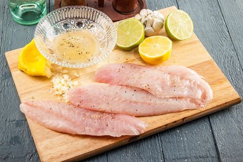 A slightly sweet fish with hints of nuttiness, red snapper is versatile, able to adapt to a variety of bold flavor profiles, from Asian to Mediterranean, as well as the smokiness imparted from grilling. Red snapper is best grilled whole or with the skin left on to protect the delicate meat from the rigors of cooking over open flame. Have your... Snapper Fillet Recipes, Salmon Fish Tacos, Grilled Red Snapper, Red Snapper Fillet, Red Snapper Recipes, Snapper Recipes, Snapper Fish, Grilled Fish Recipes, Fish Dinner Recipes