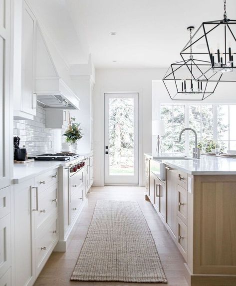 @Nikkisplate posted to Instagram: I can not share enough of @tricklecreekyyc 's work! Loving the warm toned islands against the white cabinets! Yes or No? 👉 Follow @nikkisplateblog for more home decor and recipes! 🏠 🥘 . . . . . . #prettyhomes #luxuryhouse #luxuryhome #housesofig #homesofig #interiordesign #houseandhome #decor #style #houses #homedecor #decorinspo #inspo #houseinspo #houseinspiration #kitchens #kitchendesigns #kitchen Interior Exterior Doors, Pantry Doors, Farmhouse Kitchen Design, Doors Sliding, Kitchen Farmhouse, Kitchen Inspiration Design, Modern Farmhouse Kitchens, Beautiful Kitchens, Exterior Doors