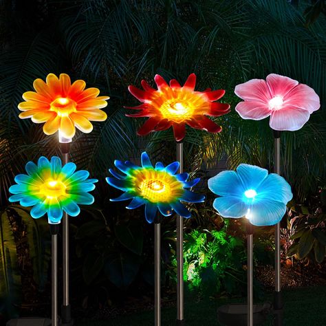 PRICES MAY VARY. Variety of Garden Stake Lights:Colored flower,This makes your garden look colorful even during the day Easy to install: Simply attach the stainless steel parts to a soft surface with direct sunlight Outdoor decoration for four seasons: Solar yard lights can be placed in front yards, back yards, sidewalks, around courtyards or porches, fountains, wedding themed parties to make your garden or back yard look like a fairy tale Solar power supply: Automatic on/OFF Dusk to dawn, there