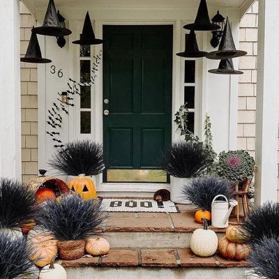 This set includes 12 bundles of artificial wheat grass plants, each featuring 7 branches. The total length of the large outdoor grass plants ranges from approximately 12 to 17 inches, providing ample quantity to meet your decoration and replacement needs. | The Holiday Aisle® Fake Grass Halloween Plants for Window Garden Patio Pathway Front Porch Halloween Decor 12Pcs gray/Black | Home Decor | C111776592_1318888538 | Wayfair Canada Classy Halloween Exterior Decor, Southern Gothic Halloween Decor, Fall Decorations Front Porch, Covered Front Porch Decor, Front Porch Halloween Decor, Porch Halloween Decor, Halloween Front Door Decor, Front Porch Halloween, Fall Patio Decor