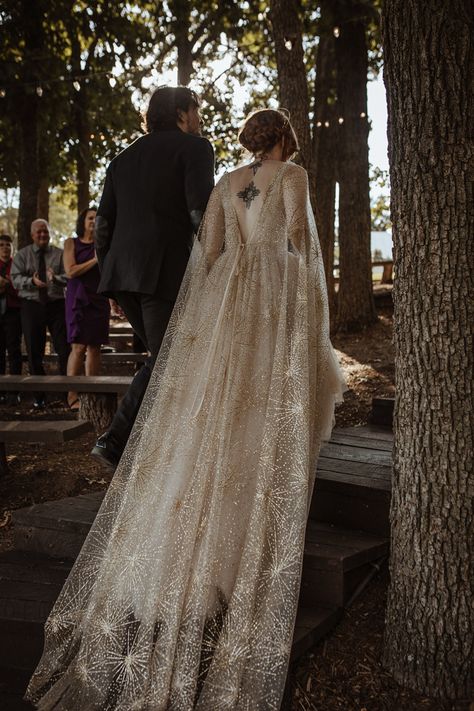 #darkromantic #moodyromantic #forestwedding #outdoorwedding #celestial #celestialwedding #celestialweddingdress #wedding #weddingideas #weddingdress #weddingphotography #weddinginspiration #weddingdecor #weddinghair #weddingflorals #weddingflowers #fairytalewedding #darkfairytalewedding Rustic Gothic Wedding Dress, Gothic Romantic Wedding Dress, Lotr Inspired Wedding Dress, Lotr Wedding Dress, Dark Academia Wedding Dress, Elf Wedding Dress, Enchanted Forest Wedding Dress, Fairytale Forest Wedding, Mythical Wedding