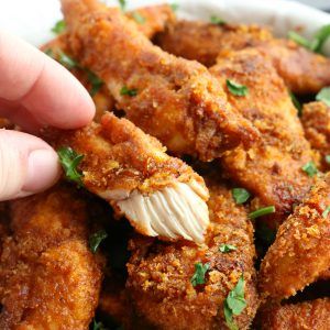 Healthier Oven Fried Chicken Tenders {Low Fat, Baked} - The Busy Baker Oven Fried Chicken Tenders, Easy Oven Fried Chicken, Oven Baked Fried Chicken, Oven Baked Chicken Tenders, Healthy Fried Chicken, Baked Fried Chicken, Chicken Strip Recipes, Fried Chicken Strips, Fried Chicken Tenders