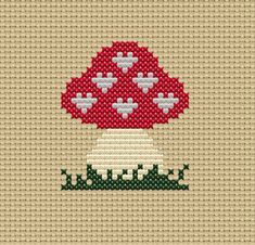 Toadstool with Hearts, Easy Cross Stitch Pattern Embrace the enchanting beauty of nature by incorporating this cross-stitch pattern into your woodland-themed decor. It adds a touch of warmth and whimsy to any space, making it a perfect addition to a nursery, living room, or even your office. Designed with beginners in mind, this pattern is user-friendly and enjoyable to work on. The clear and concise instructions make it a breeze to follow, even if this is your very first cross-stitch project. T Easy Free Cross Stitch Patterns, Mushroom Cross Stitch Pattern Free, Mushroom Kitchen Decor, Mushroom Cross Stitch, Mushroom Kitchen, Art Mushroom, Easy Cross Stitch, Easy Cross Stitch Patterns, Embroidery Wall