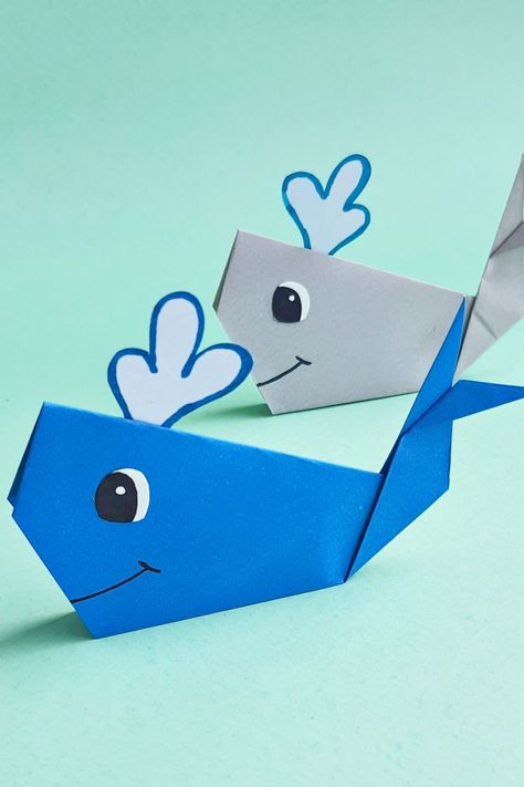 Discover the beauty of paper folding with this easy step-by-step tutorial on how to create a simple origami whale. Perfect for beginners, this guide will have you diving into the world of origami in no time! Whale Origami, Paper Whale, Fish Paper Craft, Whale Craft, Paper Plate Animals, Whale Facts, Whale Crafts, Origami Shapes, Simple Origami