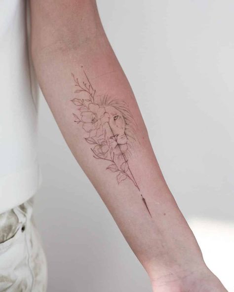 15 Best Lion Tattoo Designs to Inspire You Lioness Wrist Tattoo Women, Dainty Fine Line Floral Tattoo, Lion Line Tattoo For Women, Women Geometric Tattoo, Feminine Lion Tattoo For Women Arm, Womens Fine Line Sleeve Tattoo, Feminine Fine Line Tattoo Ideas, Line Art Lion Tattoo, Lion Leo Tattoo For Women