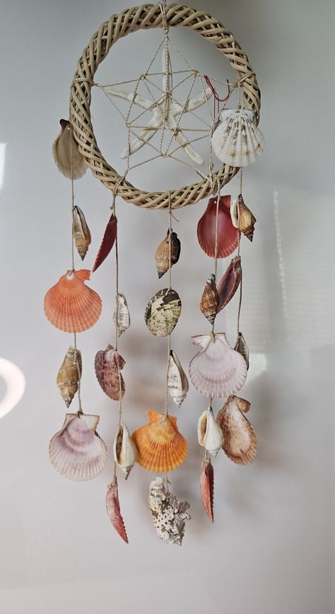 Dream Catcher. Iss from large shells of the Pacific Ocean, and Starfish Candlelight Photoshoot, Seashell Suncatcher, Seashell Dreamcatcher, Shell Dream Catcher, Witchy Products, Octopus Decor, Seashell Wind Chimes, Ocean Crafts, Name Necklaces